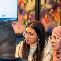 International Anchor Allies Winter 2026 First Mixer - shot of 3 female sailors